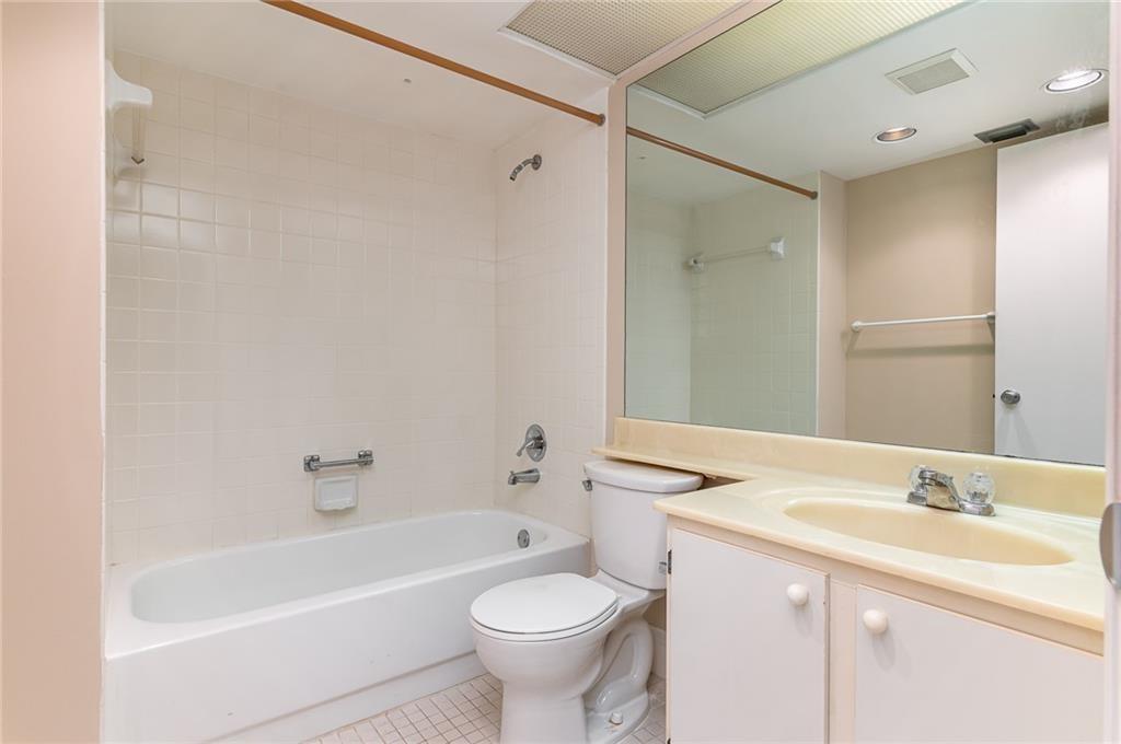 1601 Abaco Drive, Unit D1 Coconut Creek, FL 33066 - Photo 13 of 25 a bathroom with a sink toilet and shower