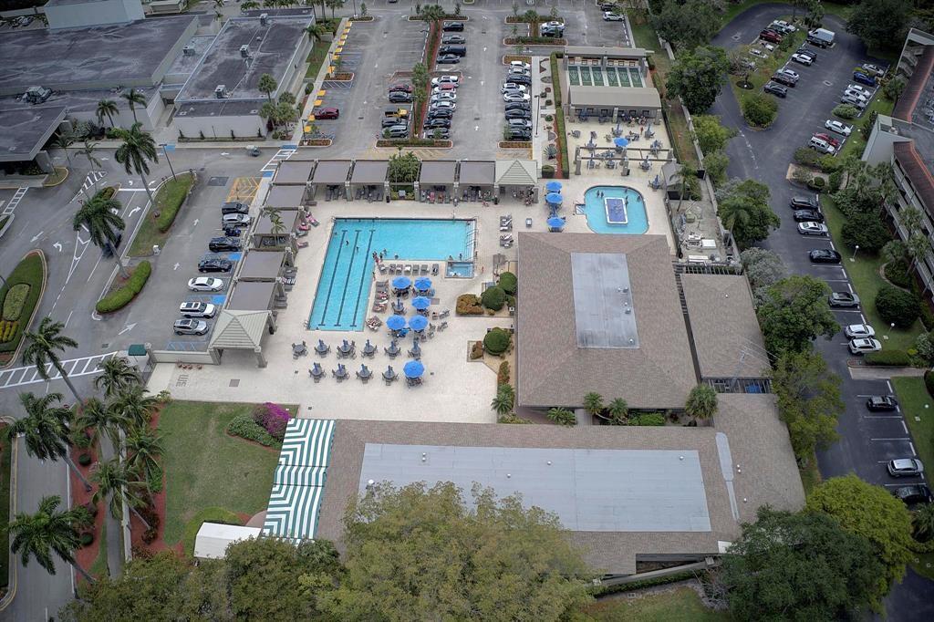 1601 Abaco Drive, Unit D1 Coconut Creek, FL 33066 - Photo 20 of 25 an aerial view of multiple houses with yard