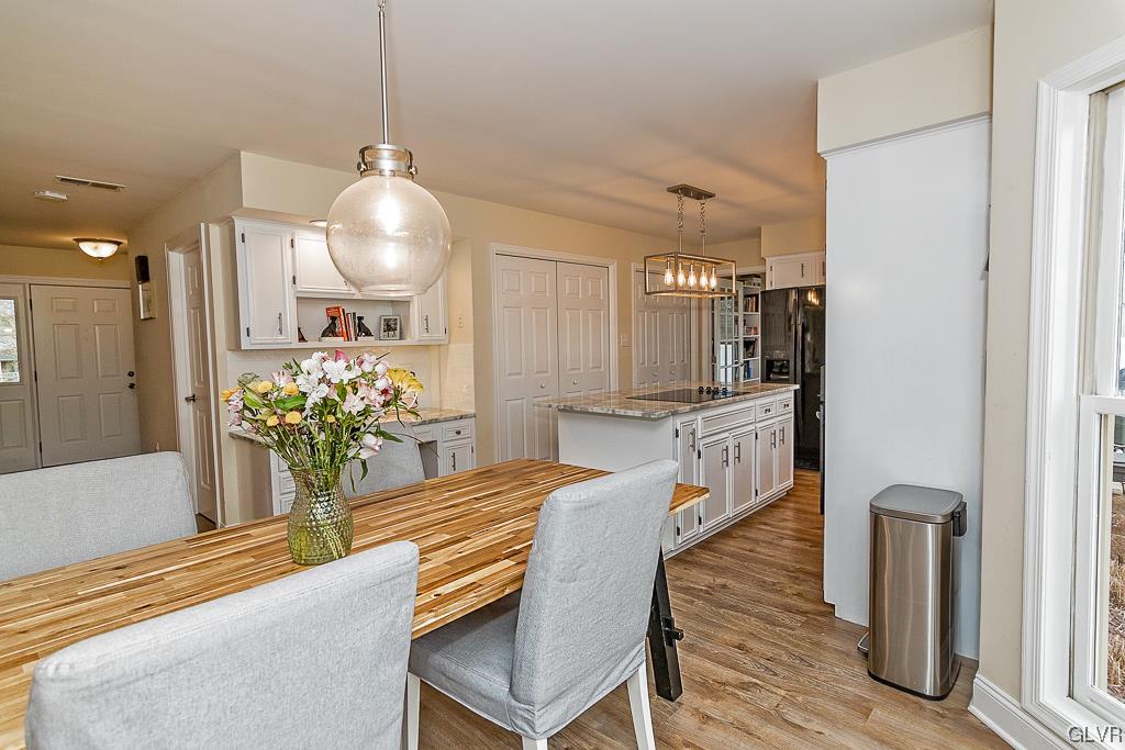973 Renaldi Road Wind Gap, PA 18091 - Photo 15 of 50 a dining room with furniture and chandelier