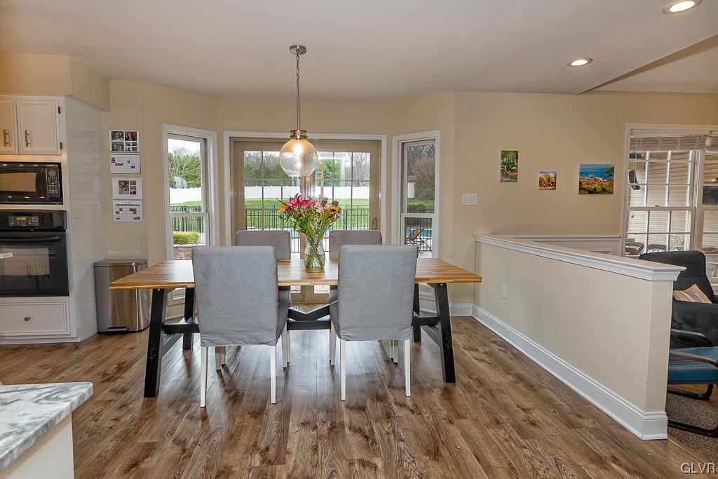 973 Renaldi Road Wind Gap, PA 18091 - Photo 17 of 50 a view of a dining room with furniture window and wooden floor