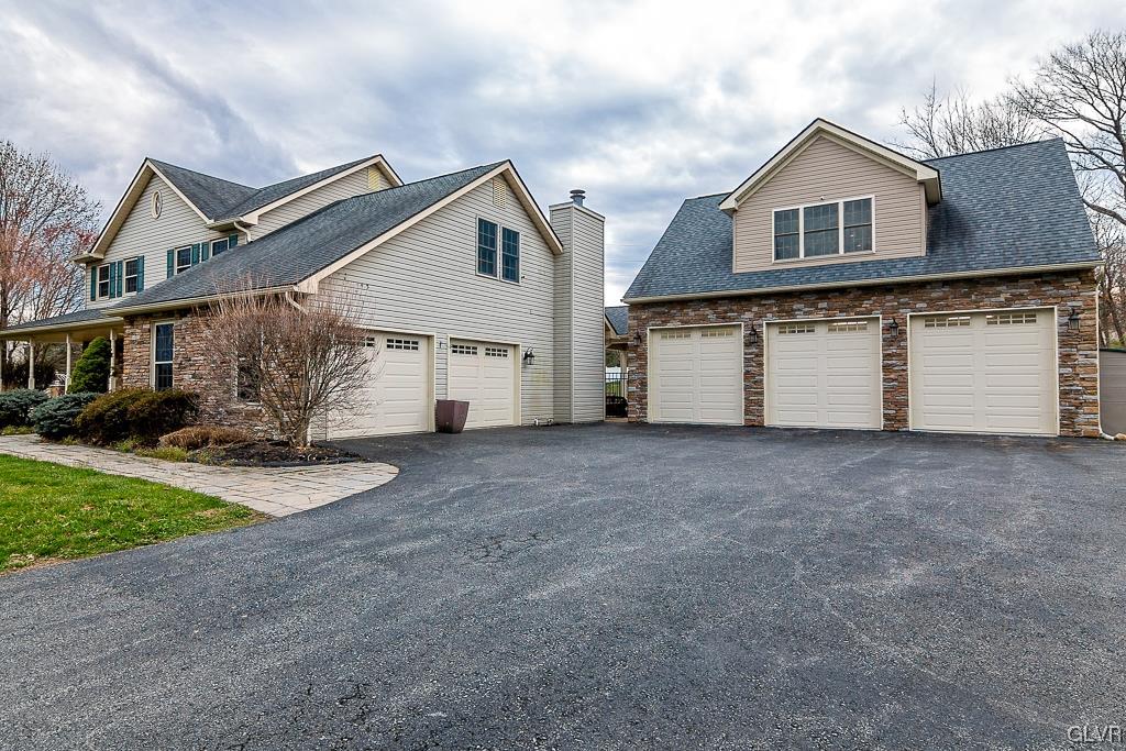 973 Renaldi Road Wind Gap, PA 18091 - Photo 21 of 50 a view of a house with a backyard and garage