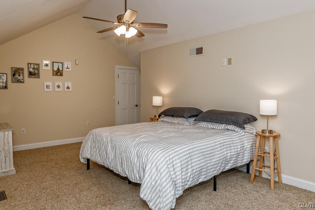 973 Renaldi Road Wind Gap, PA 18091 - Photo 29 of 50 a bedroom with a bed and a ceiling fan