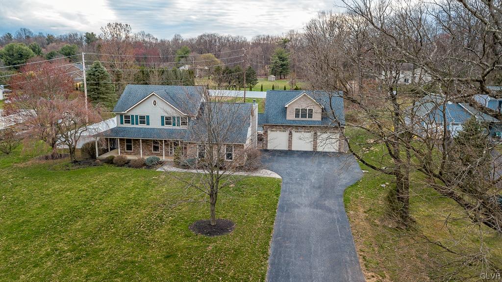973 Renaldi Road Wind Gap, PA 18091 - Photo 4 of 50 a view of a house with a big yard plants and large trees