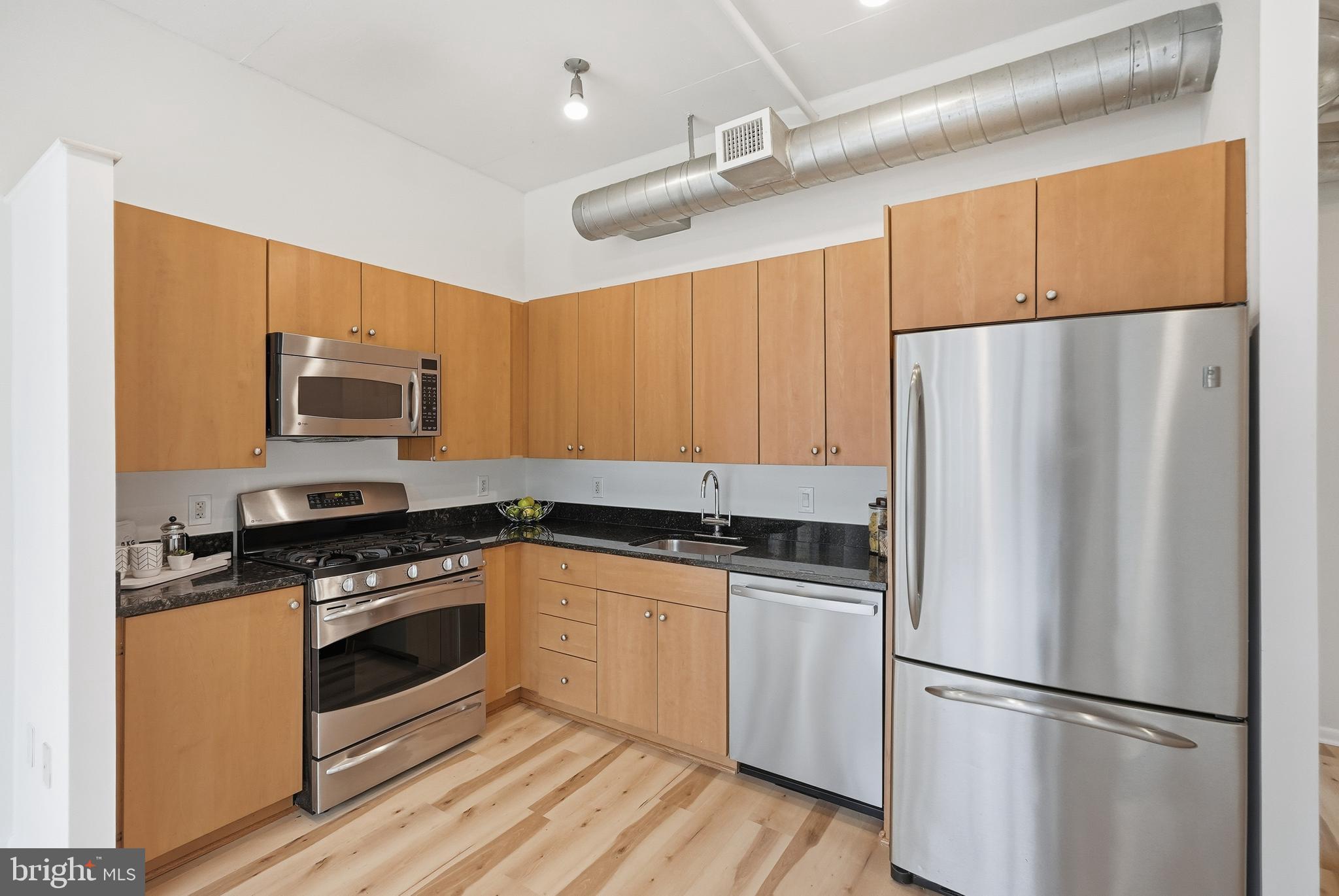 811 4th Street Northwest, Unit 404 Washington, DC 20001 - Photo 7 of 23 Kitchen w Stainless Steel Appliances & Gas Cooking