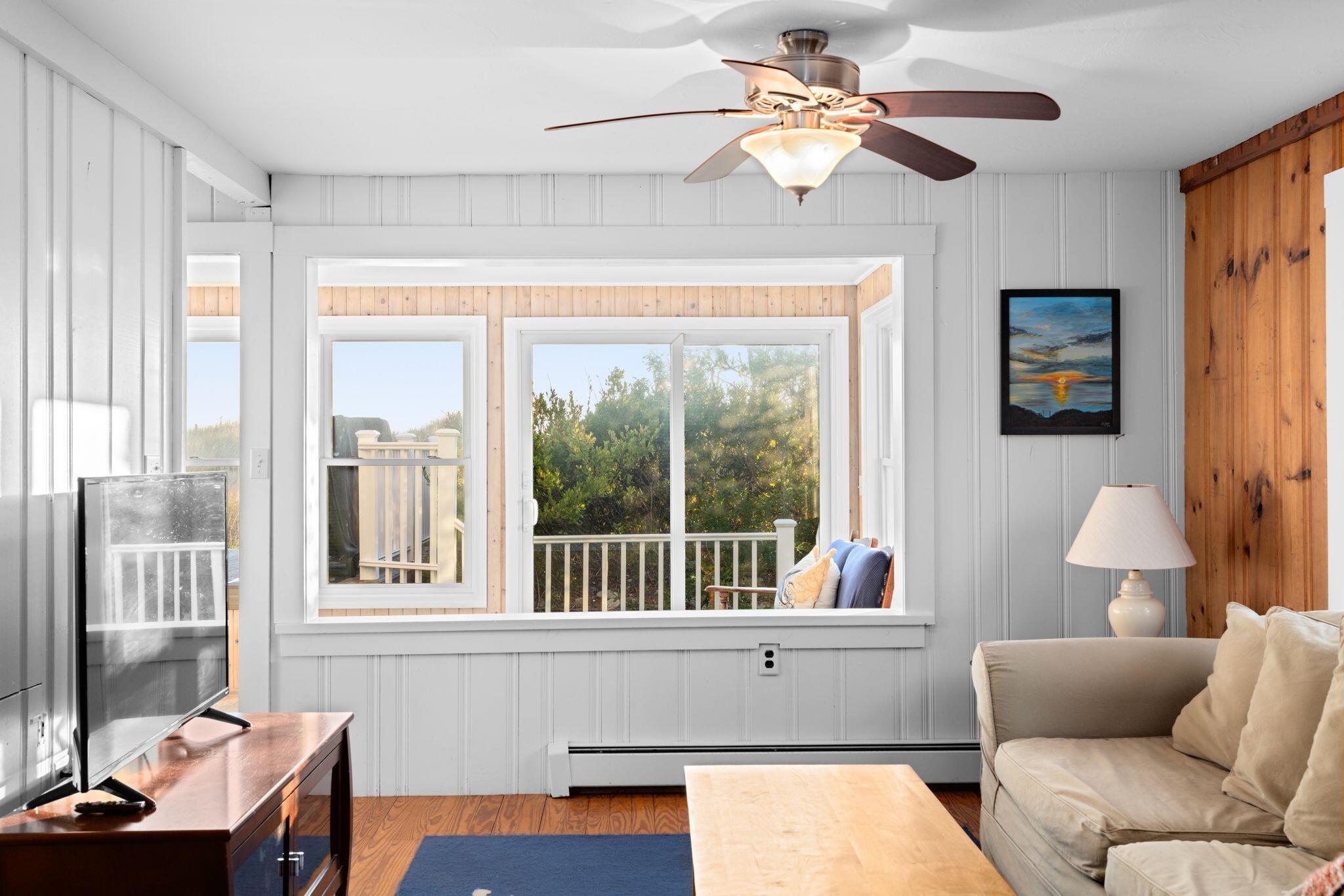 133 Phillips Road Sagamore Beach, MA 02562 - Photo 12 of 45 a living room with furniture and a window