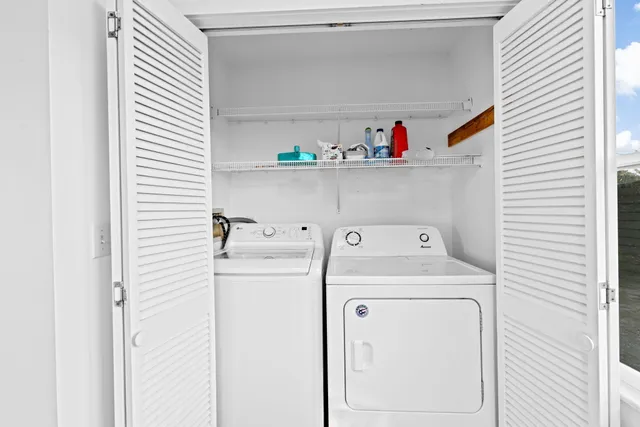 a utility room with dryer and washer