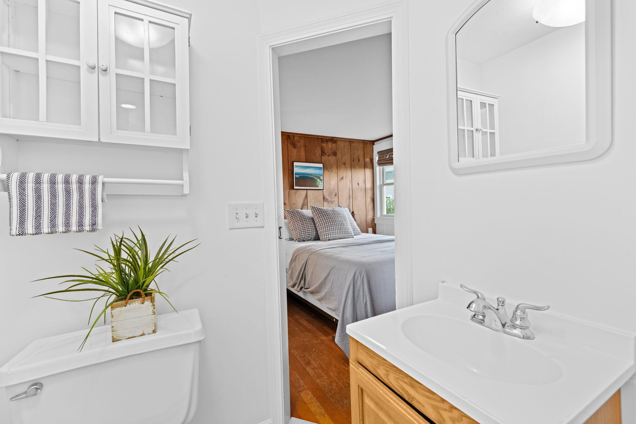 133 Phillips Road Sagamore Beach, MA 02562 - Photo 18 of 45 a bathroom with a sink a vanity and a mirror