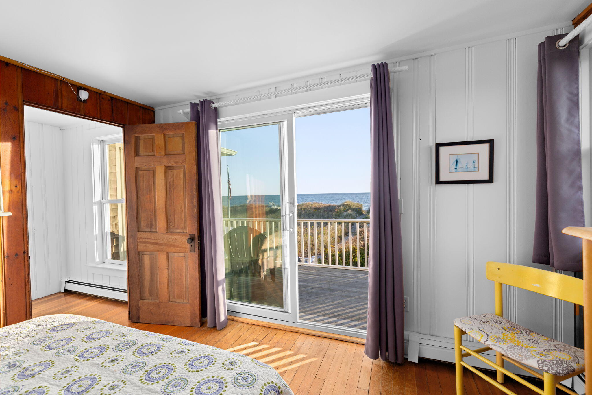 133 Phillips Road Sagamore Beach, MA 02562 - Photo 22 of 44 a bedroom with furniture and a window