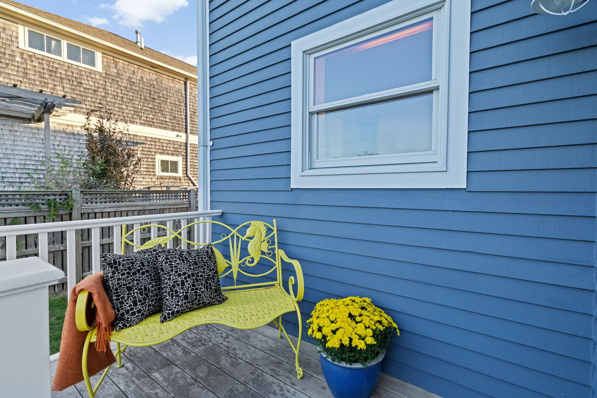 133 Phillips Road Sagamore Beach, MA 02562 - Photo 31 of 45 a front view of a house with outdoor seating