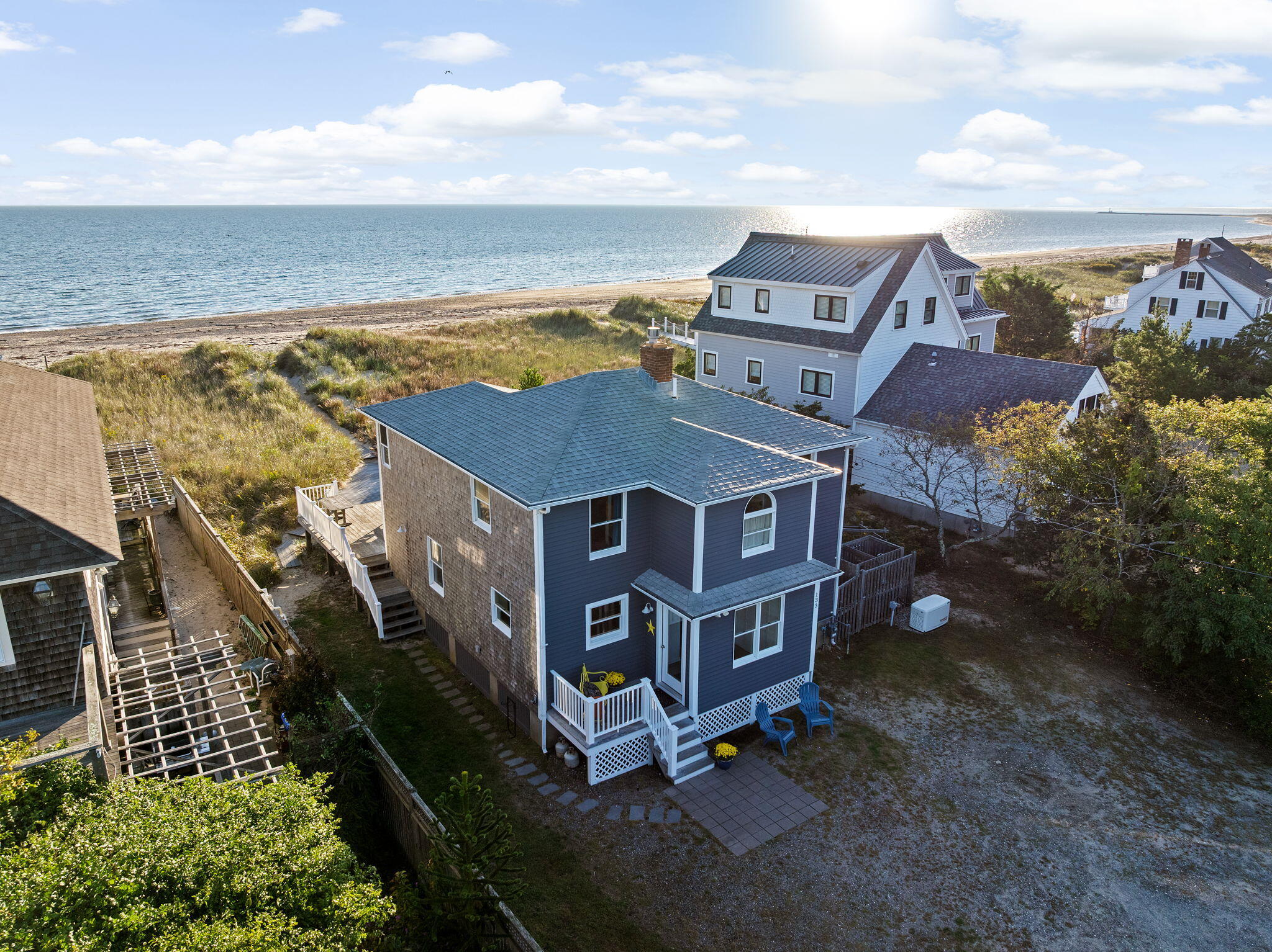 133 Phillips Road Sagamore Beach, MA 02562 - Photo 32 of 45 an aerial view of residential houses with outdoor space