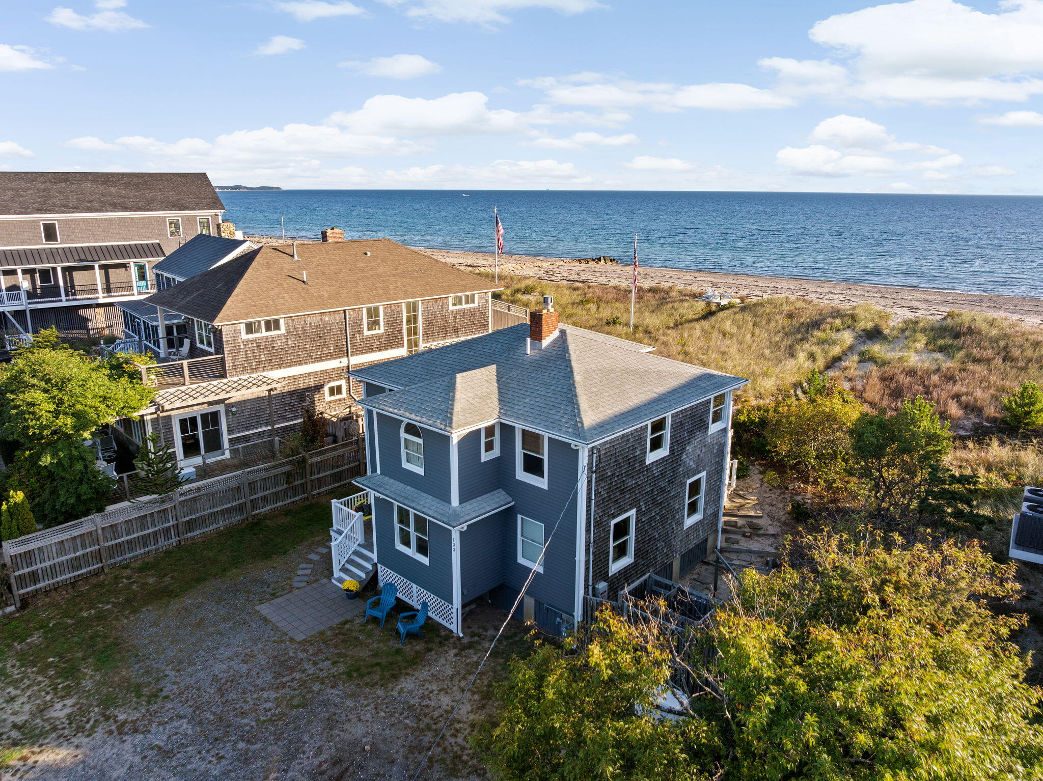 133 Phillips Road Sagamore Beach, MA 02562 - Photo 41 of 45 an aerial view of a house with a yard