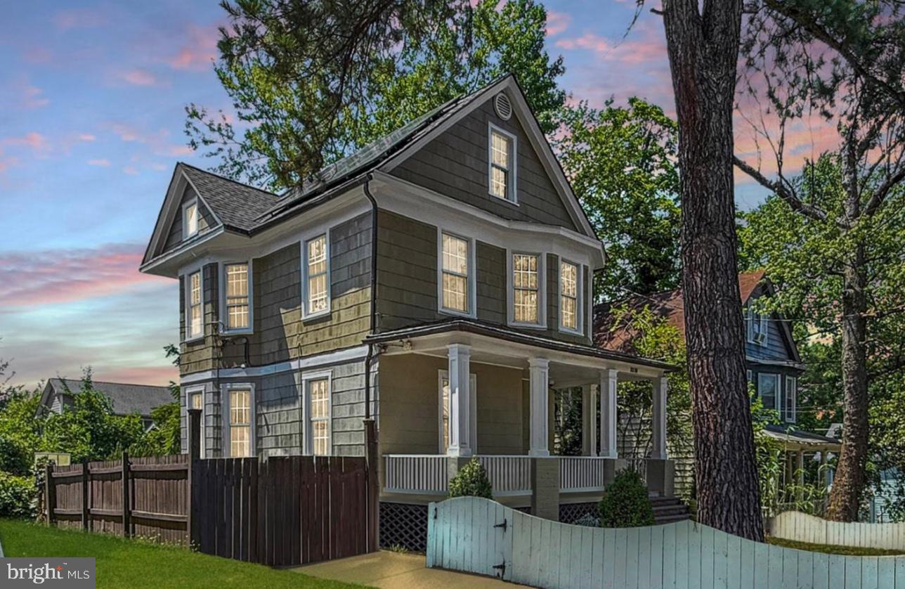3216 18th Street Northeast Washington, DC 20018 - Photo 1 of 47 Charming vintage home with lush greenery.