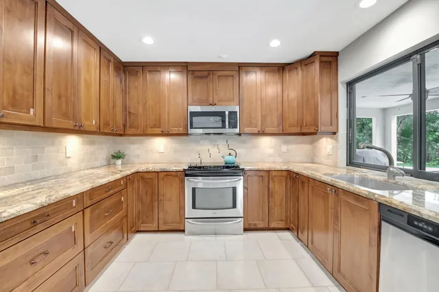 a view of a dining room with furniture