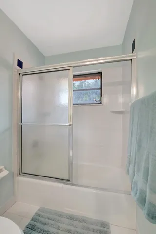 a view of a backyard with a small pool