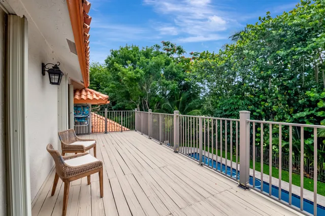 a sign on the side of the grass