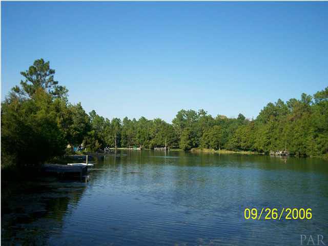 10320 West Lake Road Milton, FL 32583 - Photo 1 of 16 View of Nichols Lake