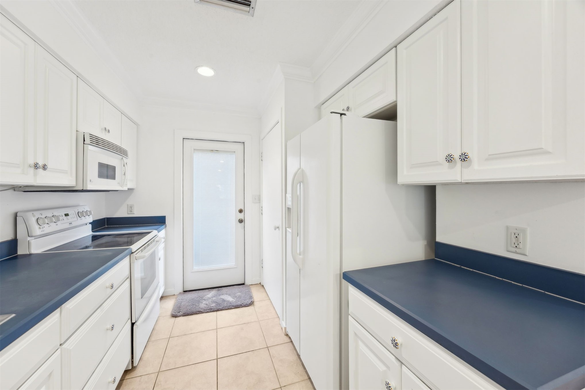 3207 Sea Marsh Road Fernandina Beach, FL 32034 - Photo 12 of 37 a kitchen with stainless steel appliances granite countertop a sink and a refrigerator