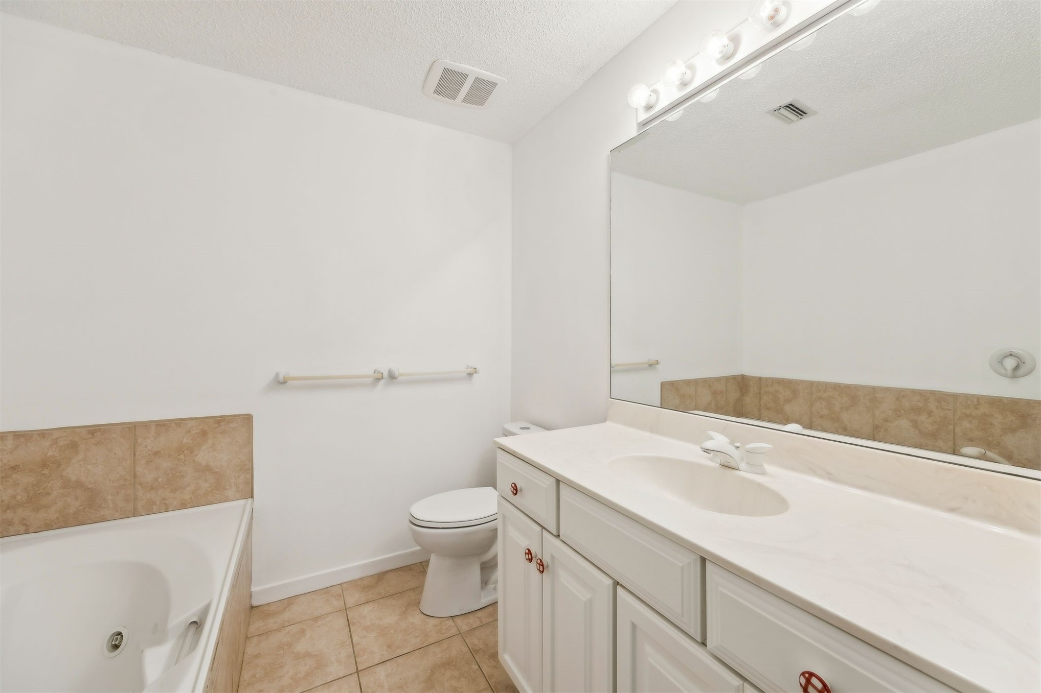 3207 Sea Marsh Road Fernandina Beach, FL 32034 - Photo 19 of 37 a bathroom with a sink a toilet and a shower