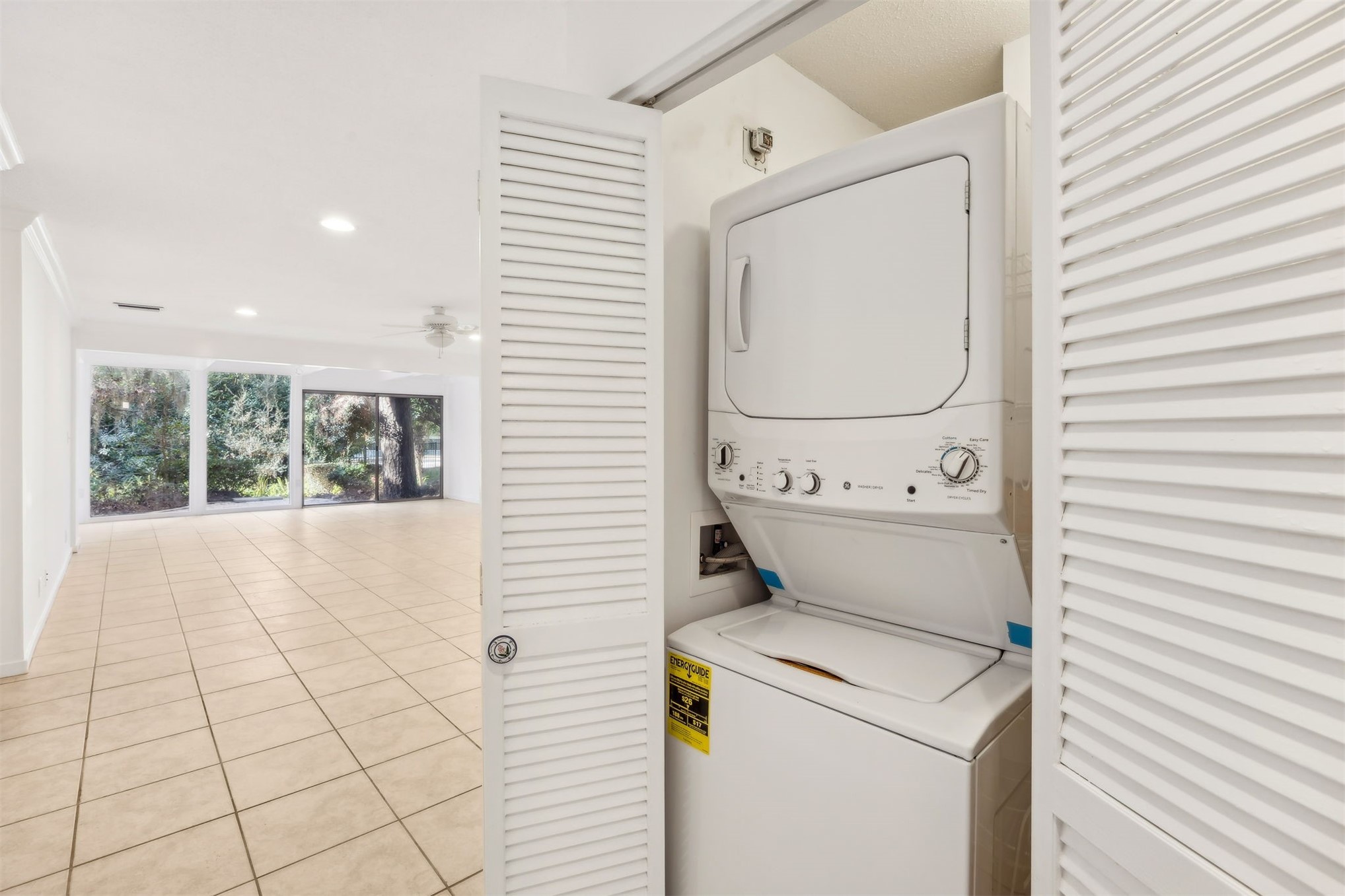 3207 Sea Marsh Road Fernandina Beach, FL 32034 - Photo 24 of 37 a view of washer and dryer with bathroom in the background