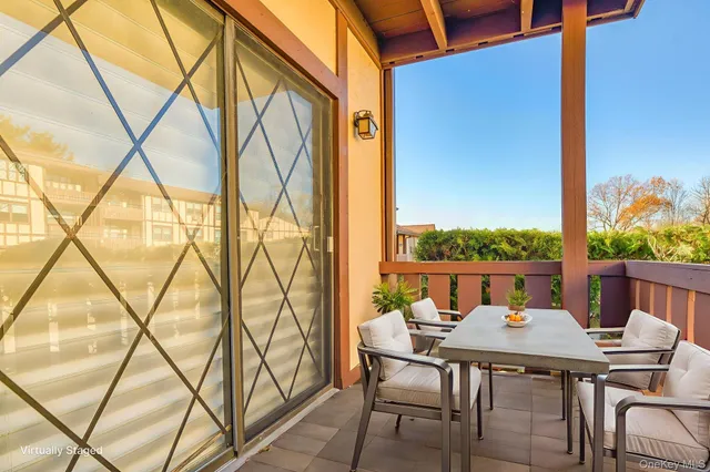 a view of an outdoor space with furniture