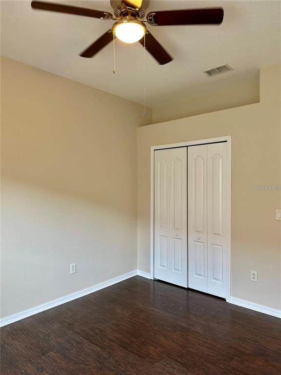 9249 Edistro Place New Port Richey, FL 34654 - Photo 46 of 82 wooden floor in an empty room