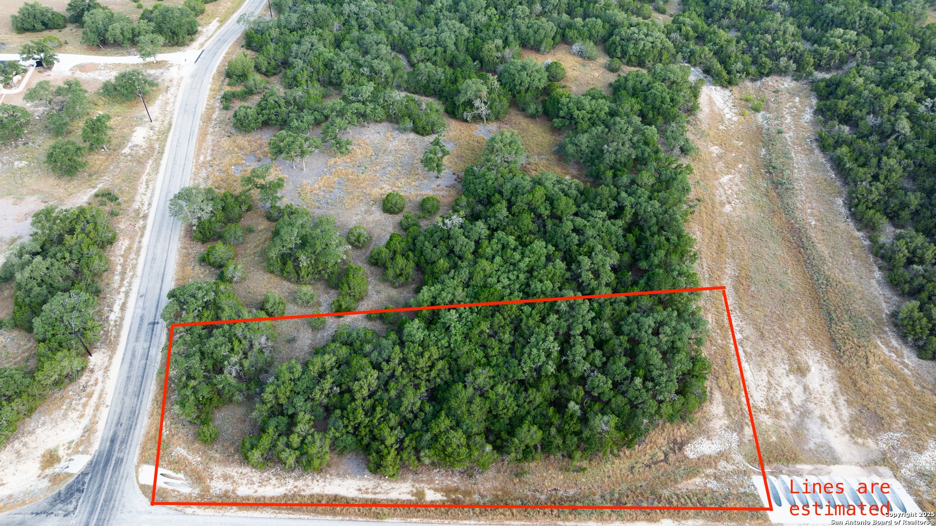 Lot 149 Serenity Pass/ Restless Wind Spring Branch, TX 78070 - Photo 1 of 15 a view of a yard with flower plants