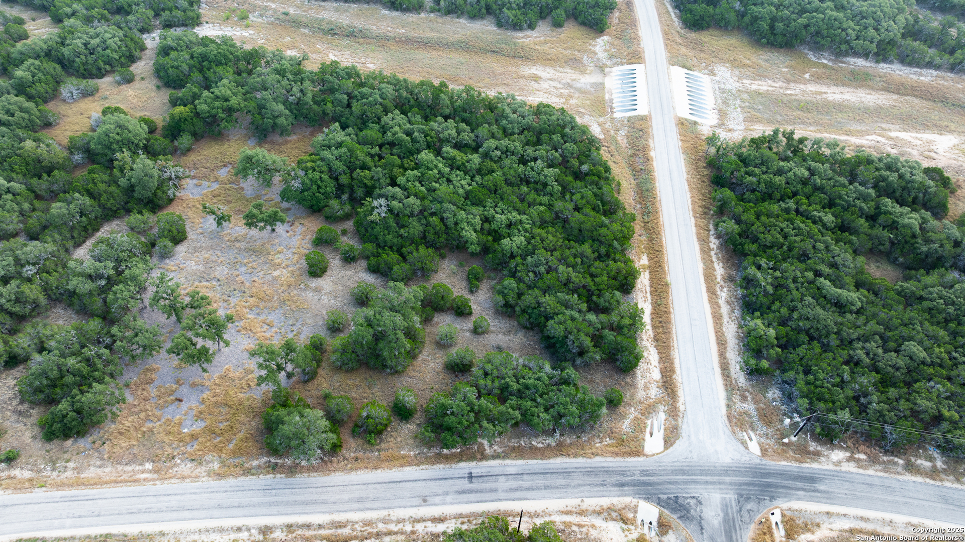 Lot 149 Serenity Pass/ Restless Wind Spring Branch, TX 78070 - Photo 7 of 15 a view of a yard from a window