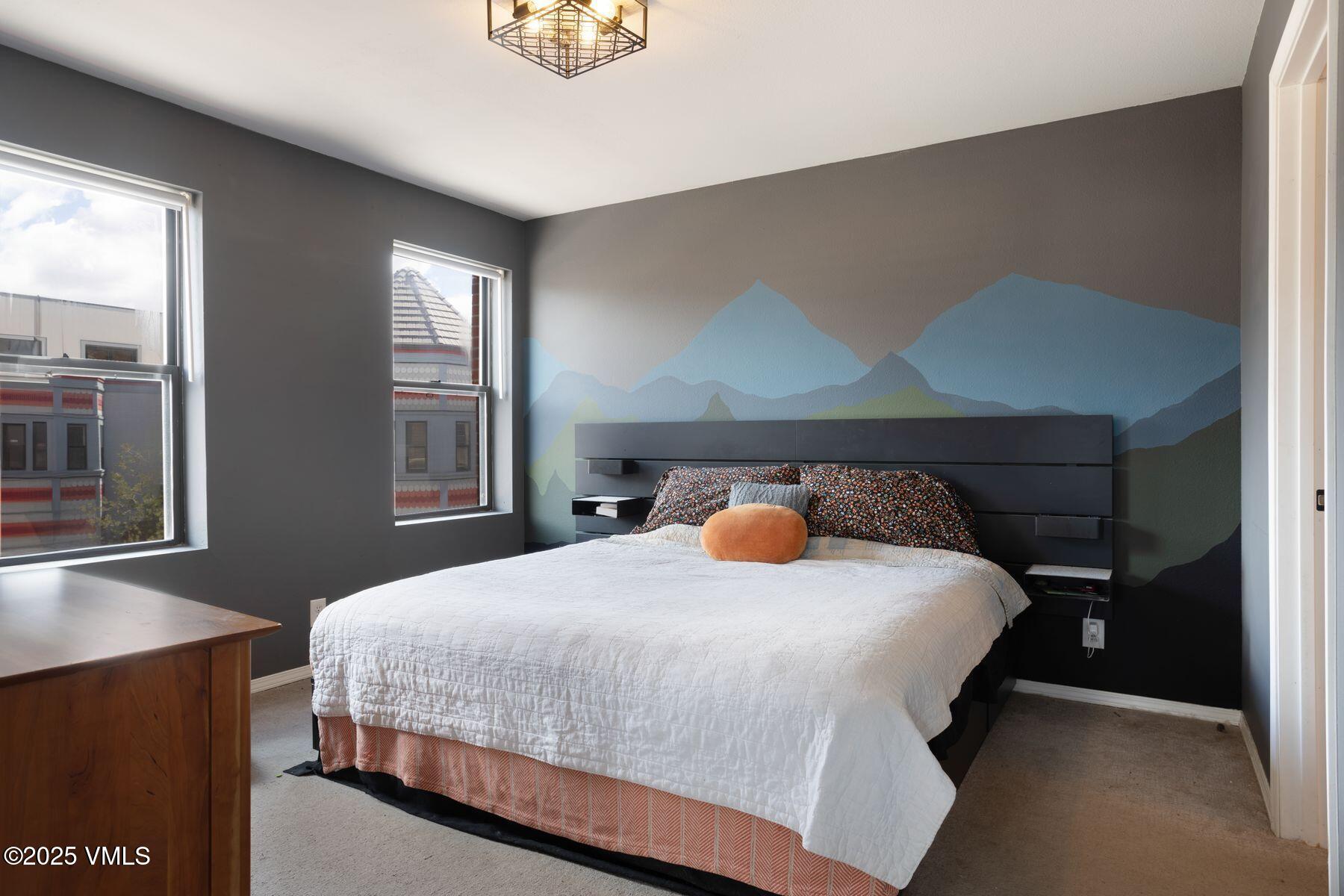 34295 Highway 6, Unit 207 Edwards, CO 81632 - Photo 13 of 23 a bedroom with a bed and window