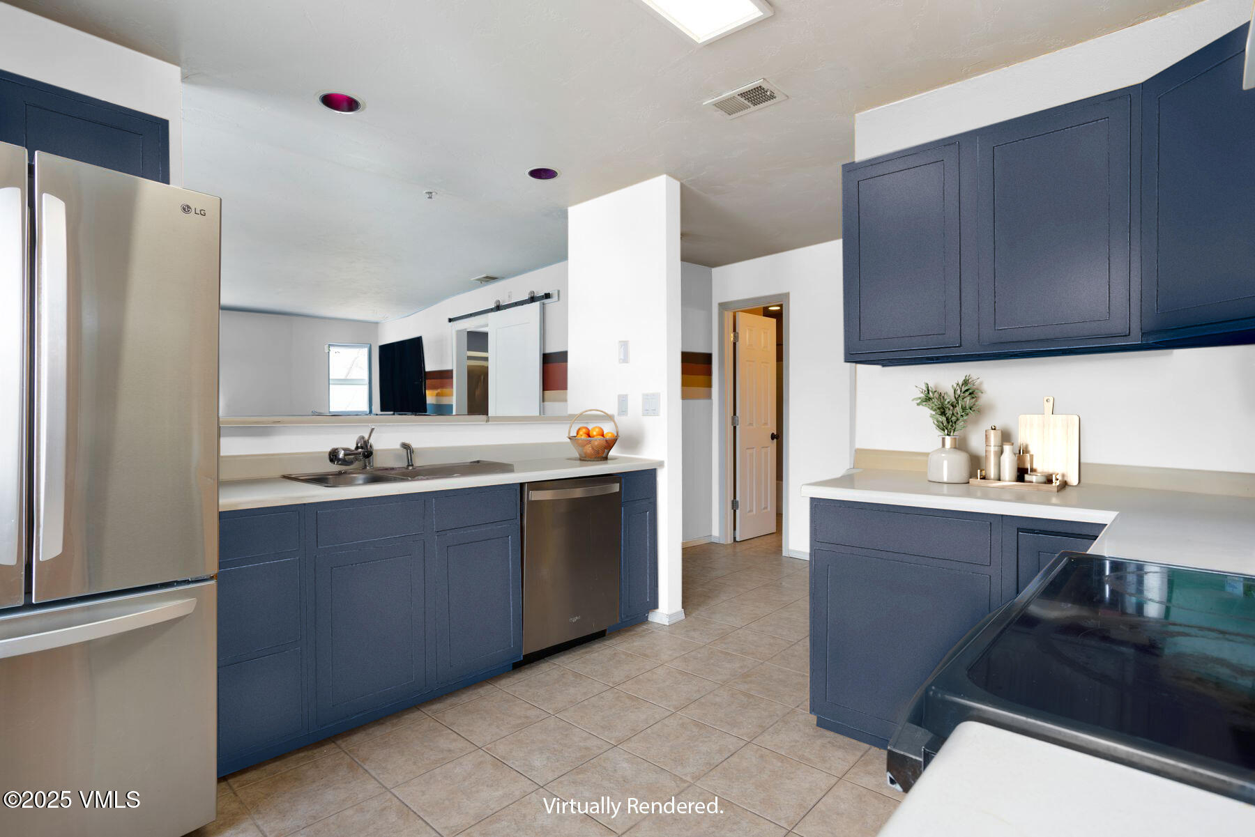 34295 Highway 6, Unit 207 Edwards, CO 81632 - Photo 8 of 23 a kitchen with stainless steel appliances a sink a stove a refrigerator and cabinets