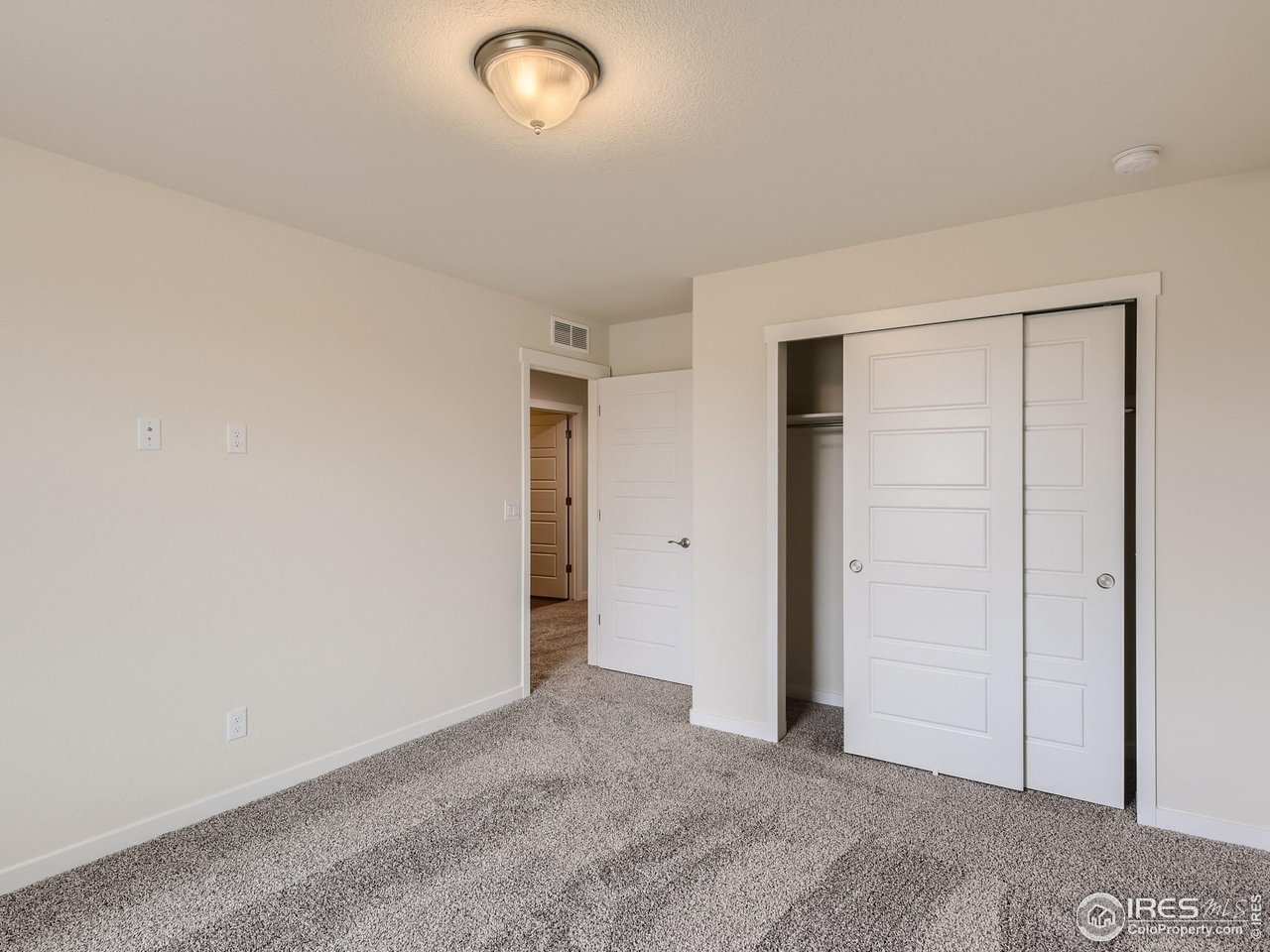 2538 Doe Rdg Way Johnstown, CO 80534 - Photo 21 of 28 an empty room with closet