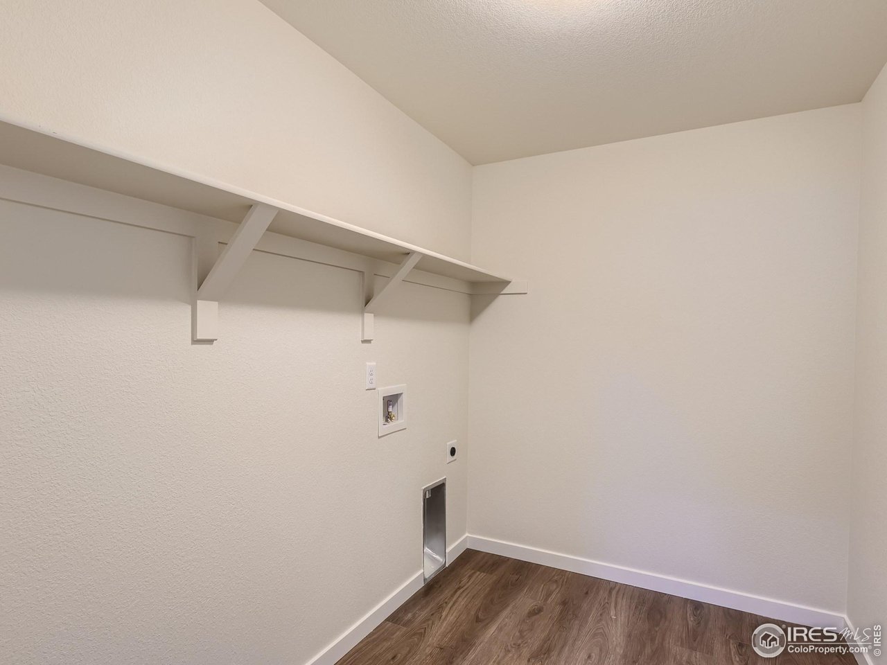 2538 Doe Rdg Way Johnstown, CO 80534 - Photo 24 of 28 a view of a room with racks on the wall
