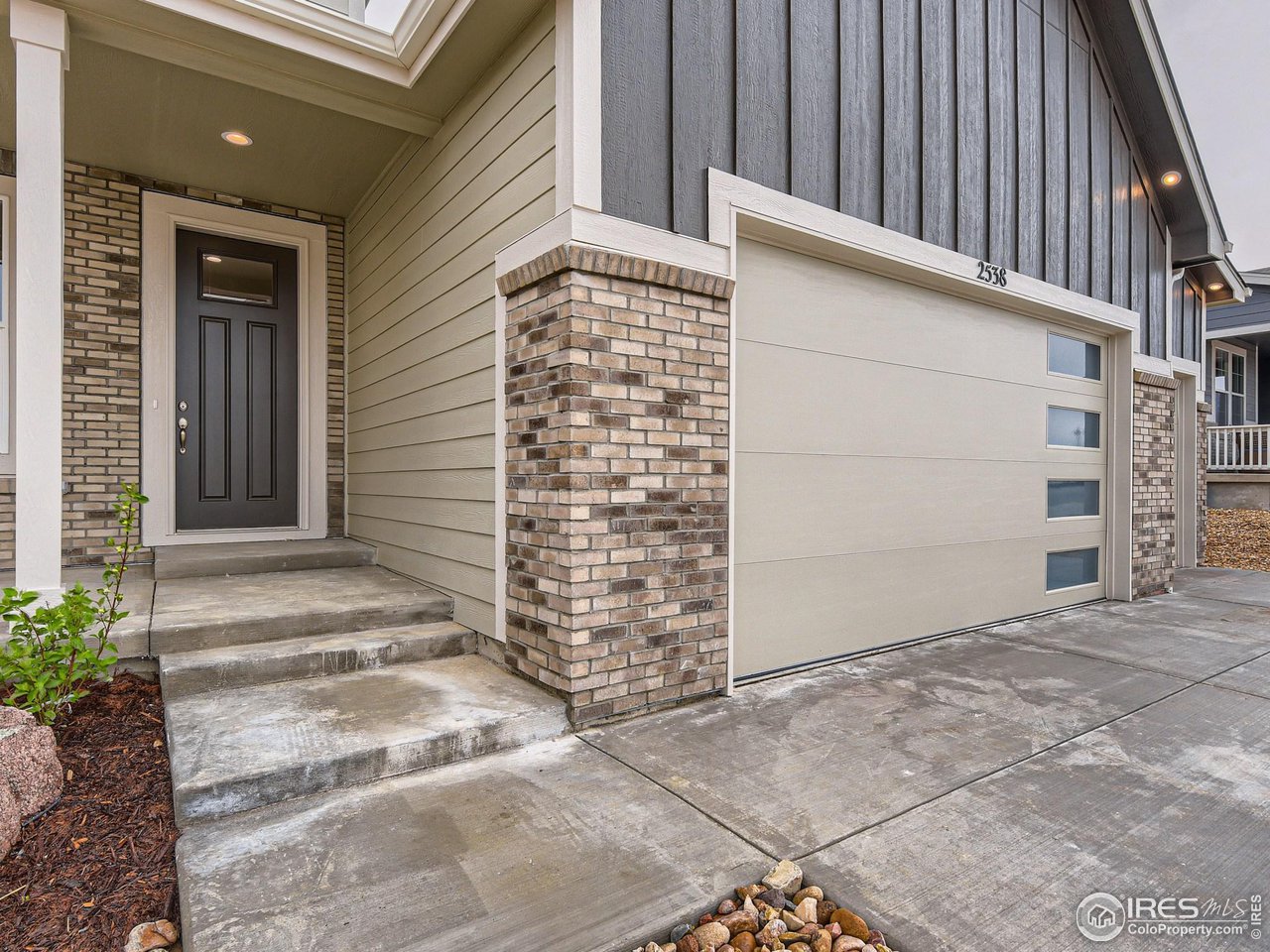 2538 Doe Rdg Way Johnstown, CO 80534 - Photo 3 of 28 a view of front door