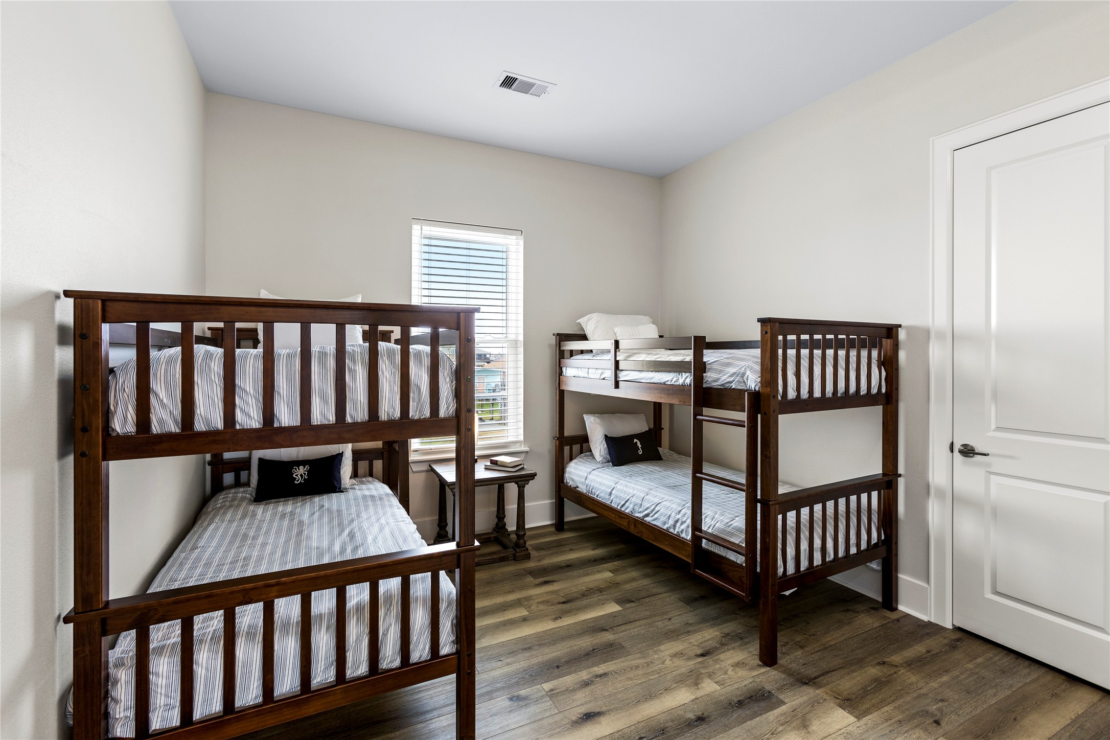 1986 Patton Beach Road Crystal Beach, TX 77650 - Photo 34 of 45 a bedroom with furniture and a window