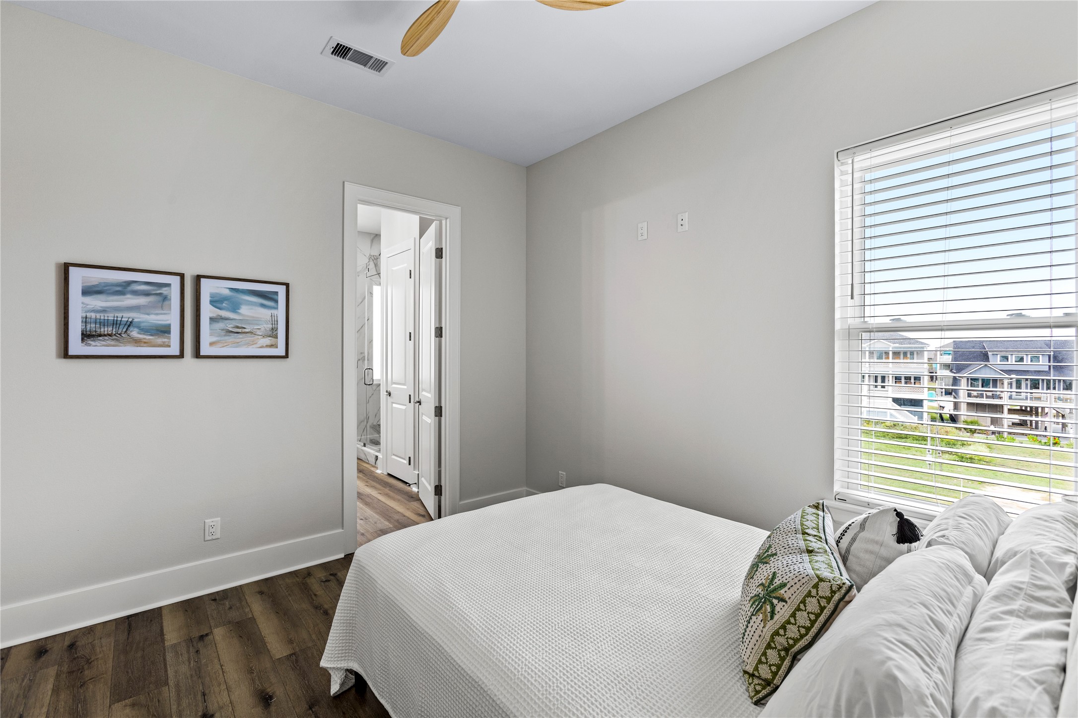 1986 Patton Beach Road Crystal Beach, TX 77650 - Photo 35 of 45 a bedroom with a bed and a window