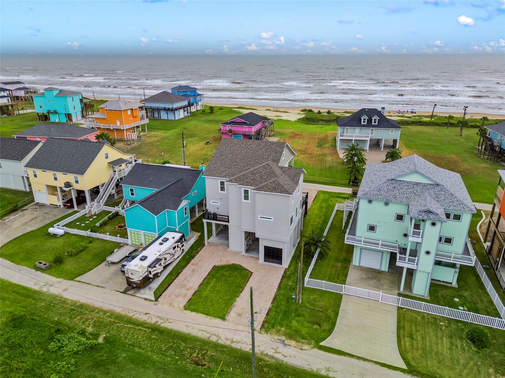 1986 Patton Beach Road Crystal Beach, TX 77650 - Photo 40 of 45 an aerial view of residential houses with outdoor space and swimming pool