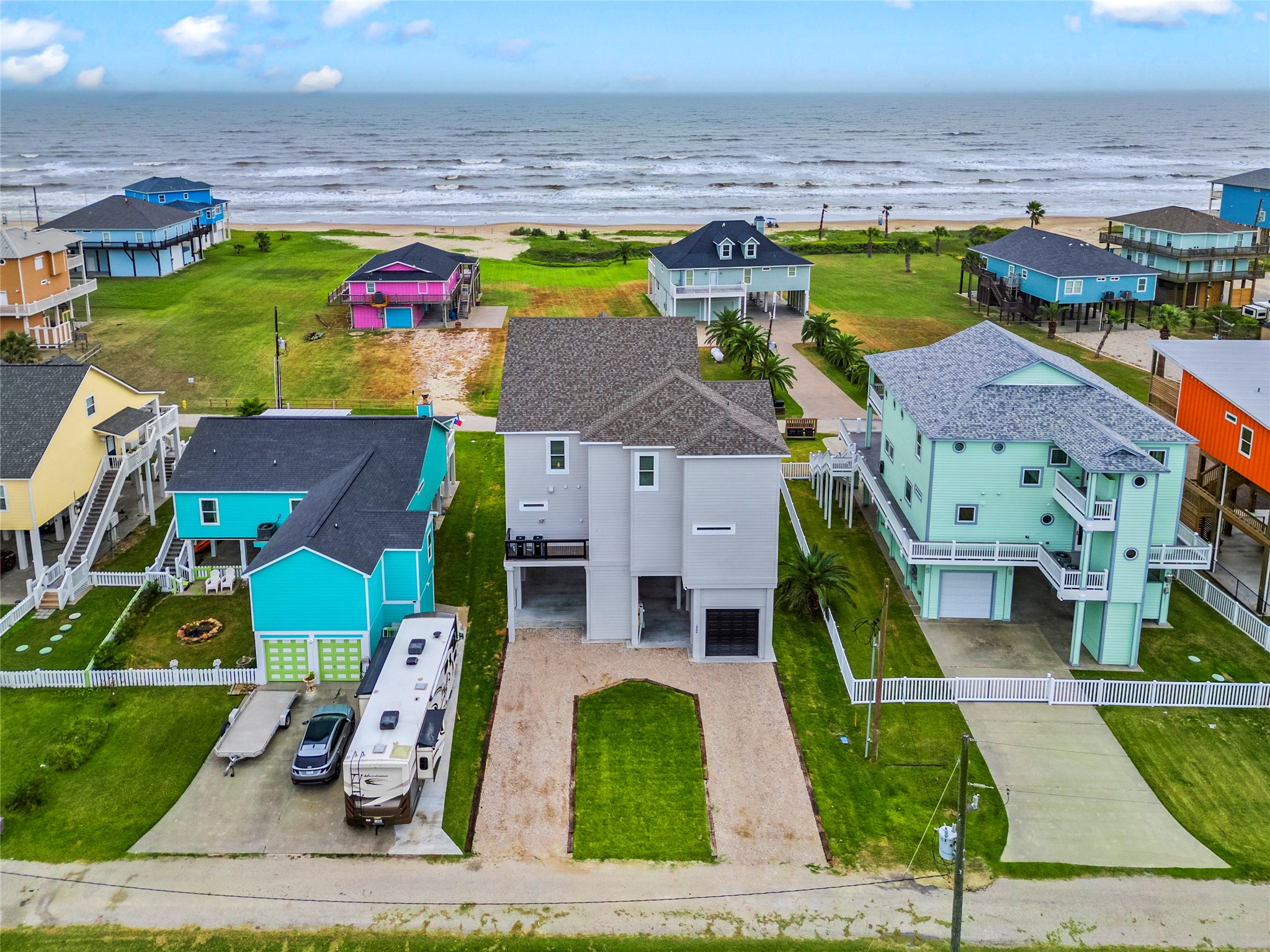 1986 Patton Beach Road Crystal Beach, TX 77650 - Photo 41 of 45 an aerial view of residential houses with outdoor space and swimming pool