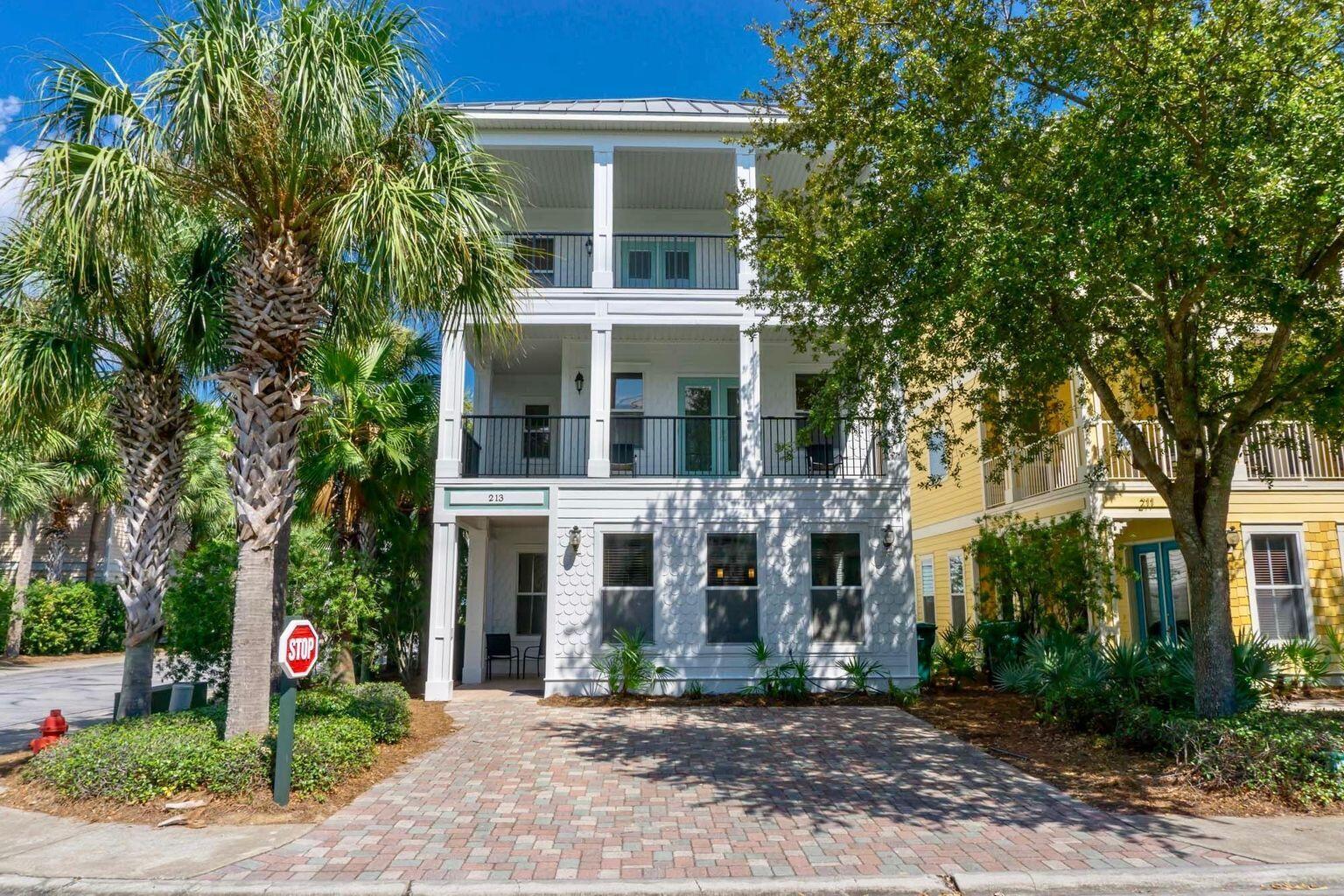 a front view of a building with garden