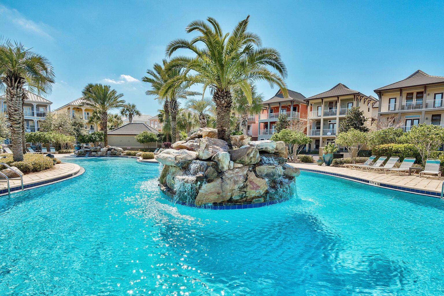 213 Grand Key Loop East Destin, FL 32541 - Photo 3 of 4 a view of a house with backyard and sitting area