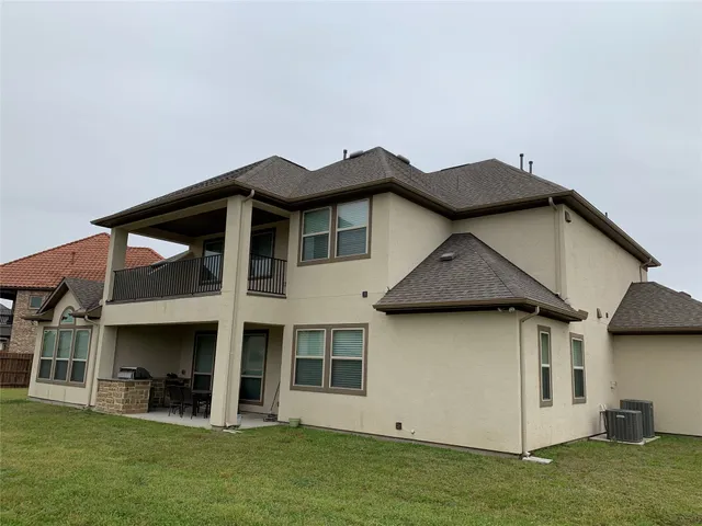 a view of a house with a garden