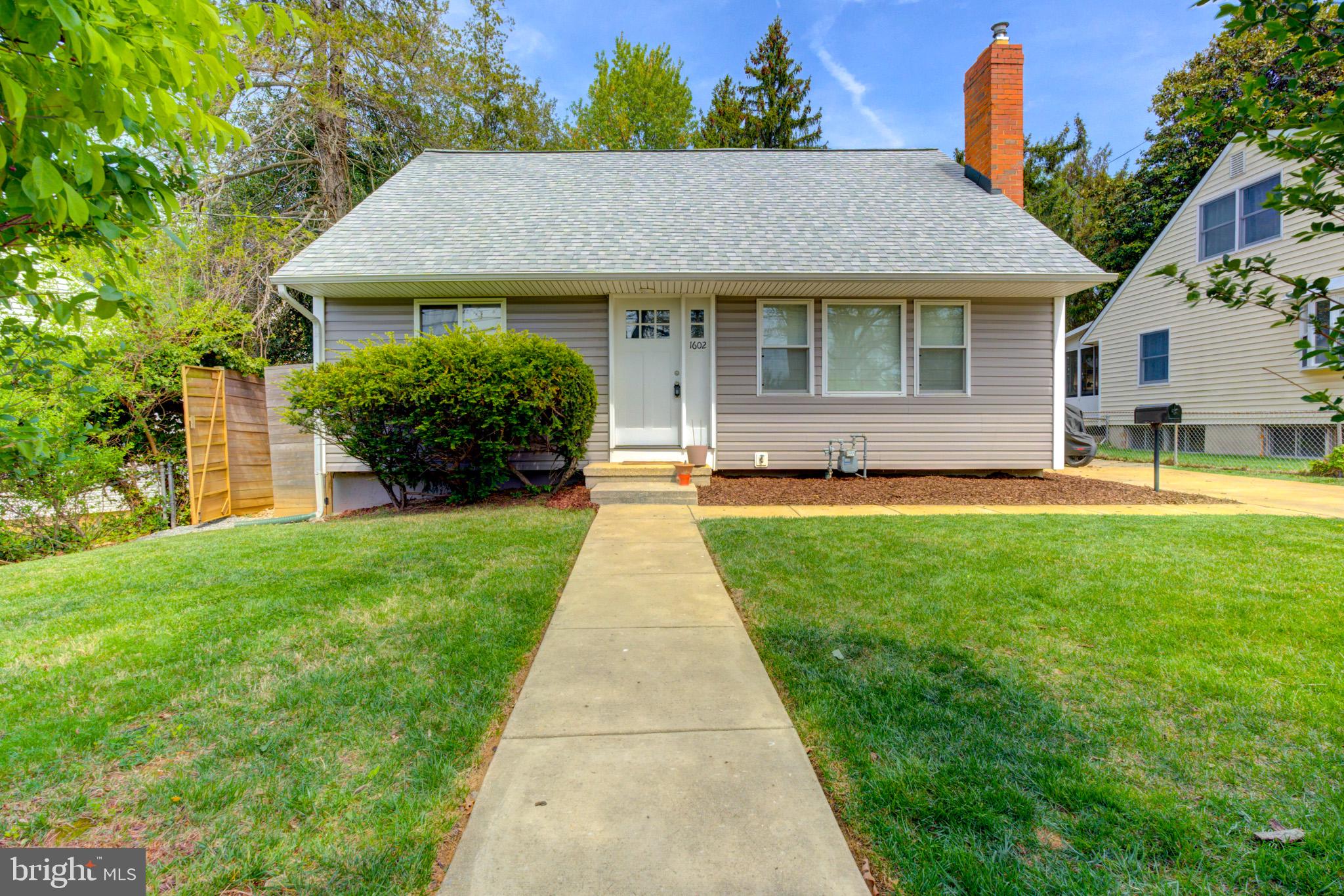 Charming home with inviting curb appeal.