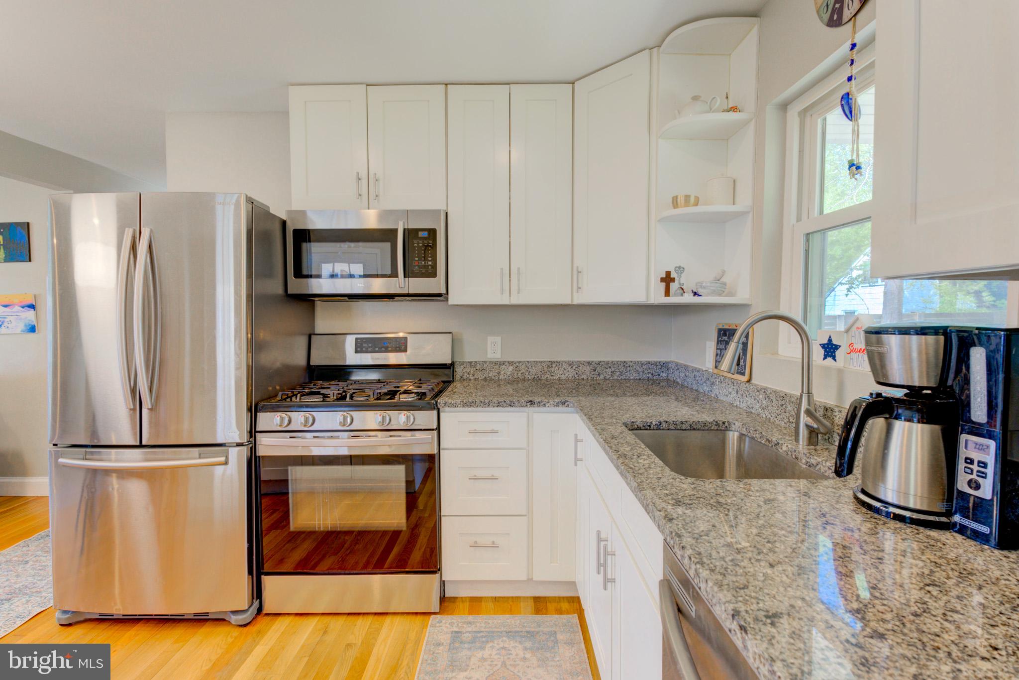 1602 Veirs Mill Road Rockville, MD 20851 - Photo 11 of 50 Modern kitchen with sleek finishes.