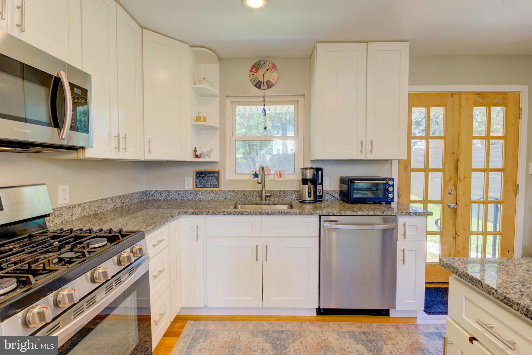 1602 Veirs Mill Road Rockville, MD 20851 - Photo 12 of 50 Modern kitchen with sleek finishes.