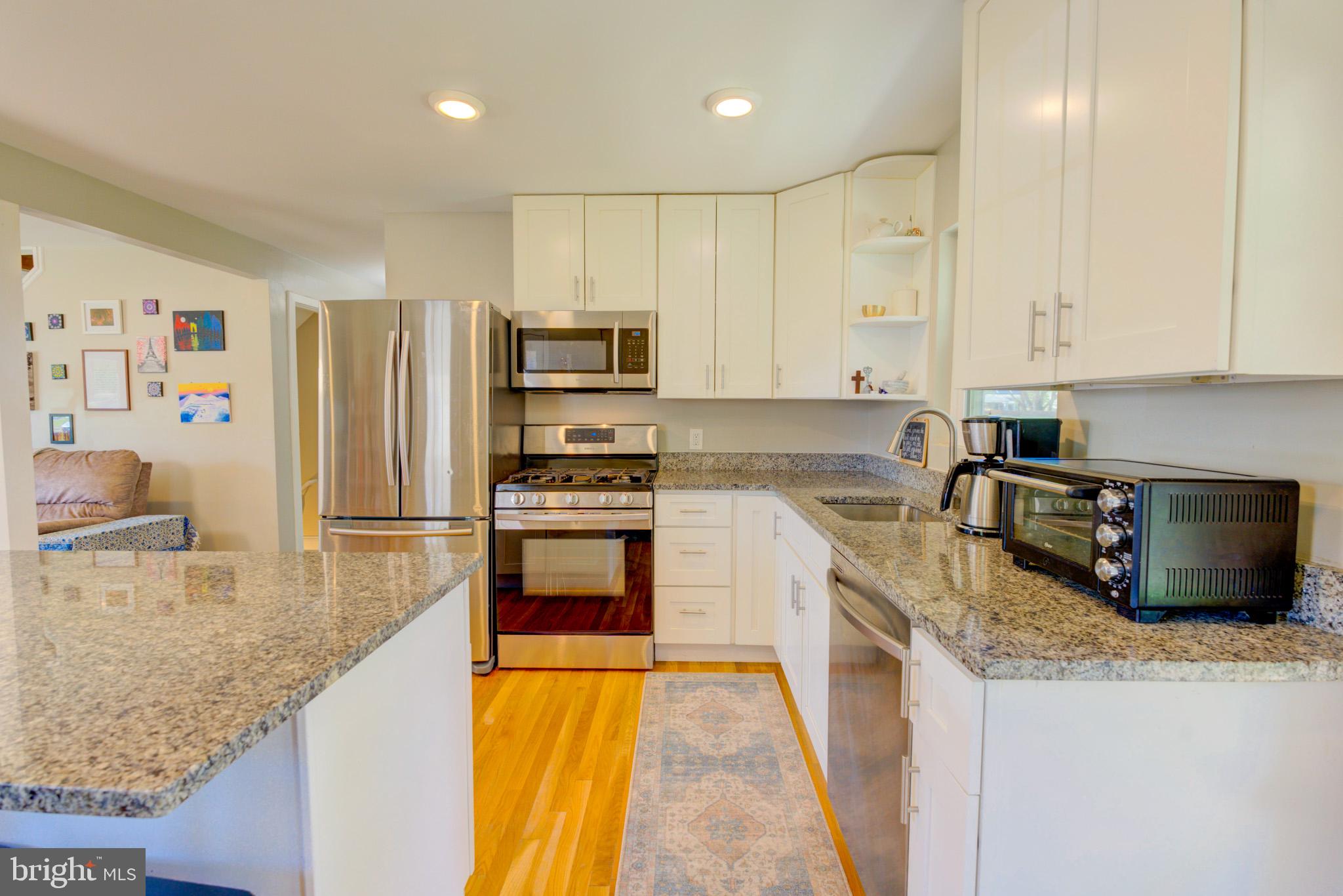 1602 Veirs Mill Road Rockville, MD 20851 - Photo 14 of 50 Modern kitchen with sleek finishes.