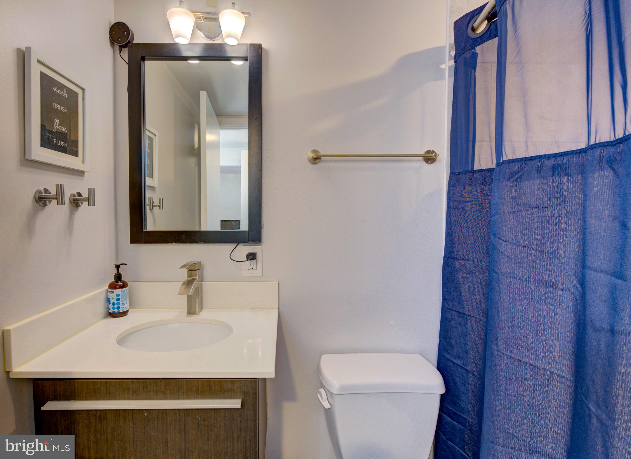 1602 Veirs Mill Road Rockville, MD 20851 - Photo 33 of 50 Modern bathroom with sleek finishes.