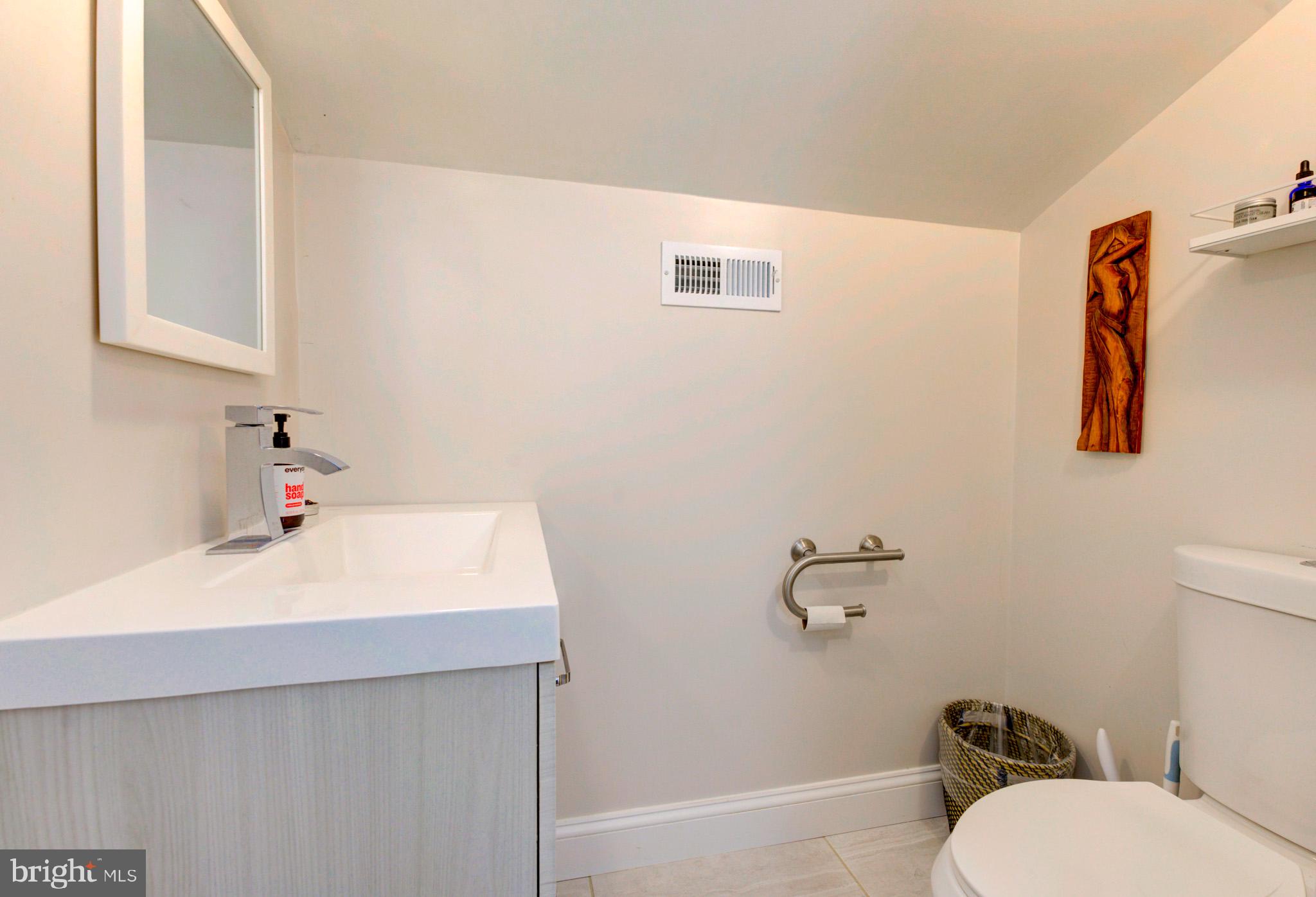 1602 Veirs Mill Road Rockville, MD 20851 - Photo 45 of 50 Charming bathroom with modern accents.