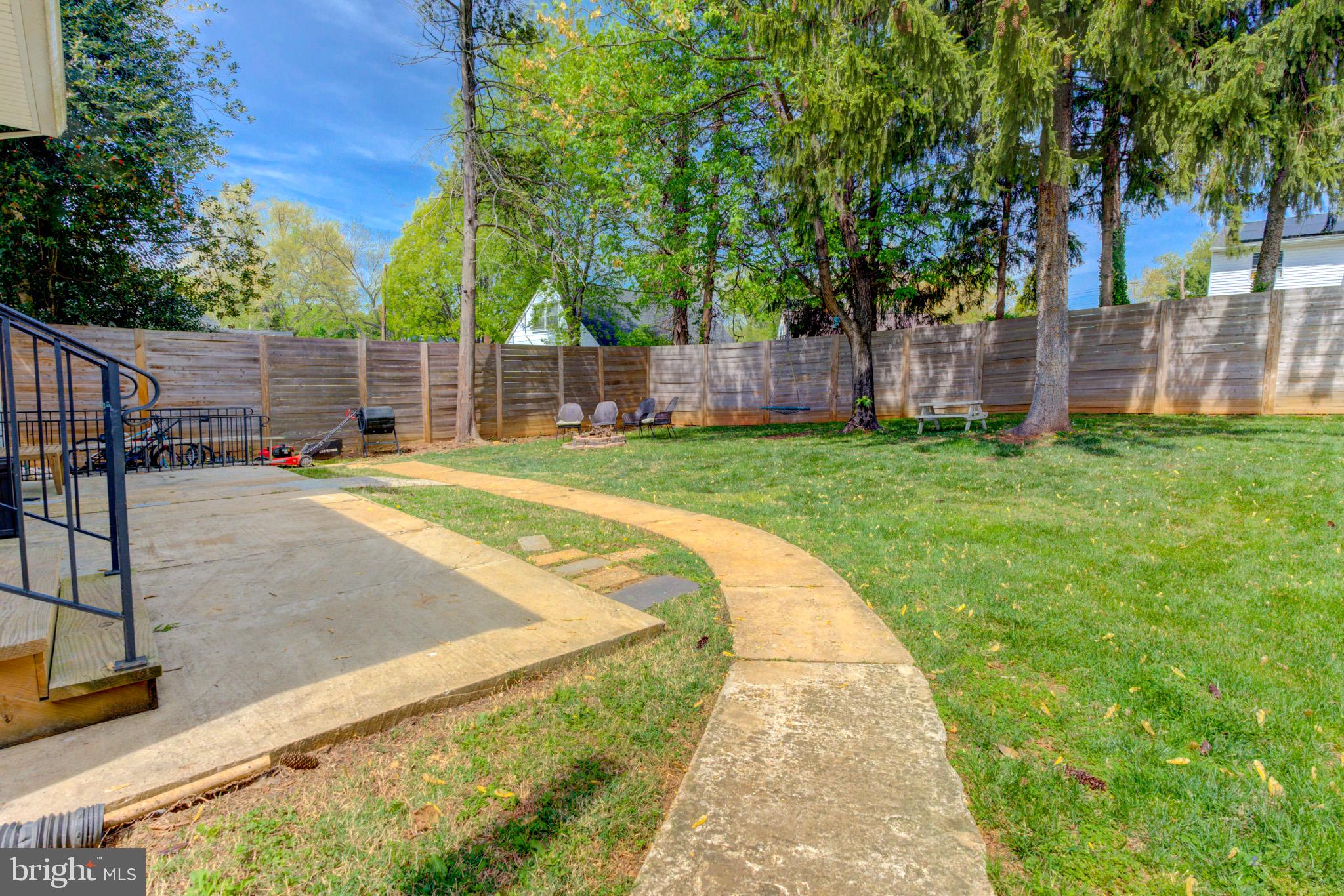 1602 Veirs Mill Road Rockville, MD 20851 - Photo 46 of 50 Serene backyard retreat with winding path.
