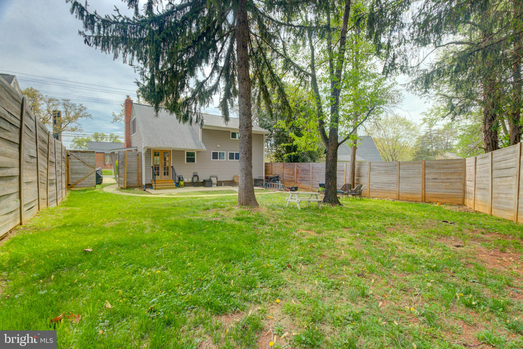 1602 Veirs Mill Road Rockville, MD 20851 - Photo 50 of 50 Serene backyard oasis with lush greenery.