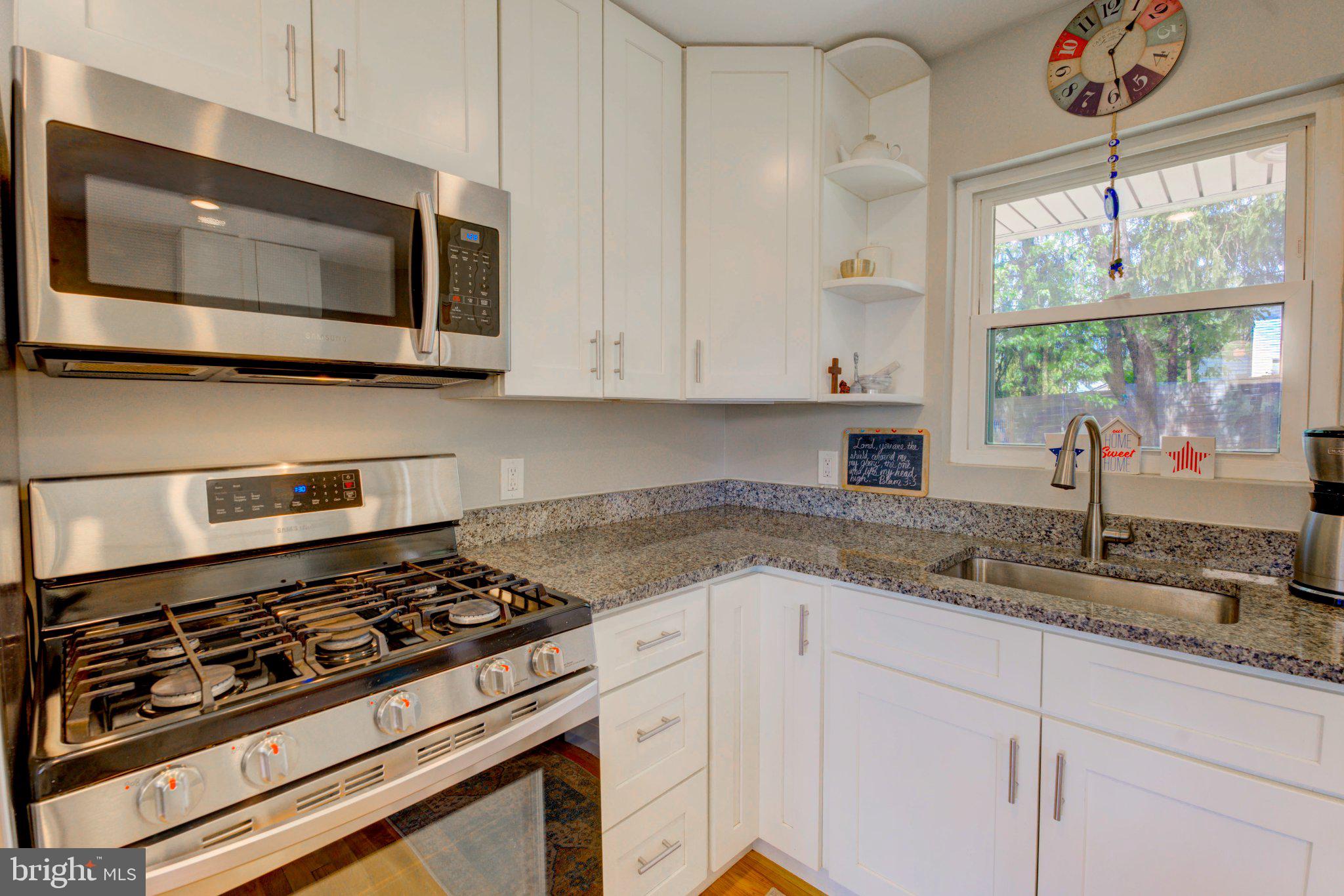 1602 Veirs Mill Road Rockville, MD 20851 - Photo 10 of 50 Modern kitchen with sleek finishes.