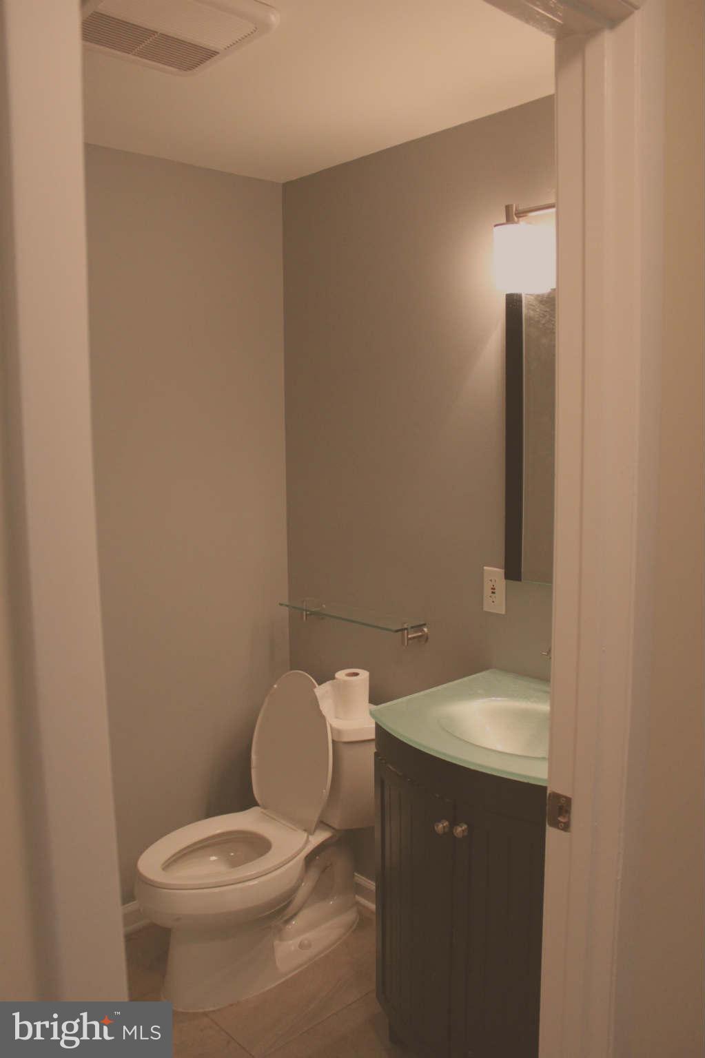 11027 Howland Drive Reston, VA 20191 - Photo 2 of 15 First level powder room