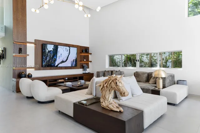 a view of a livingroom with furniture and window